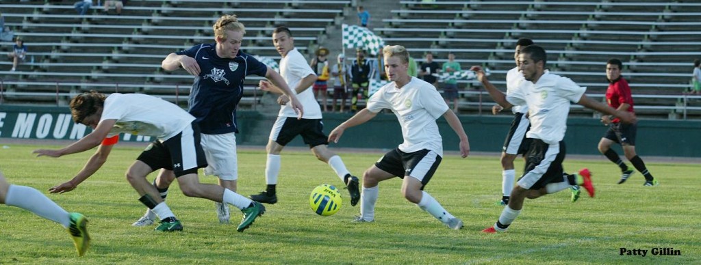 Hurt, second from right, in action with EPLWA Wenatchee FC this summer.